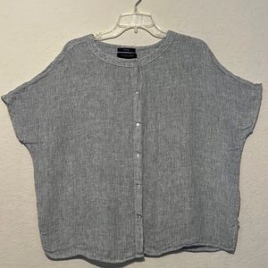 Tahari size XS shirt does fit up size med ( I tried it on and I’m a medium)